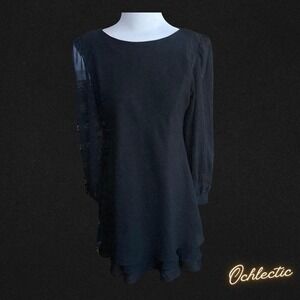 Black Hampton Niles dress with sheer sleeves and ruffled hem